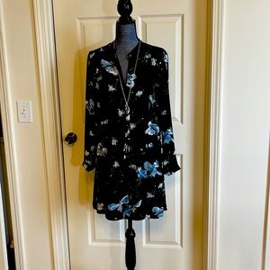 Dalia flowery pattern on black, long sleeves, shirt dress, buttons to waist line